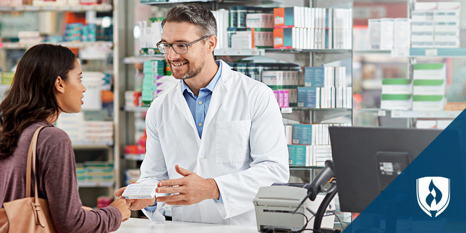 Pharmacist helping customer